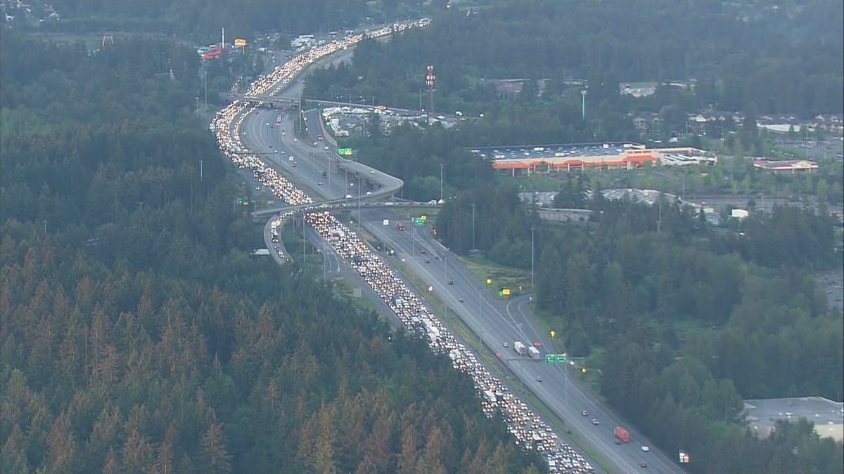 RyanKPIX's tweet photo. Latest on the overturn semi truck -- spilling its load of "chicken feathers" causing 7-mile backup NB I-5 in Federal Way.  New images from #Air4
The driver may have fallen asleep at wheel. @TheronZahnKOMO live on the scene and @parisjKOMO with the detours - #KOMONews at 6 :00AM https://t.co/lKkYHaHAuo