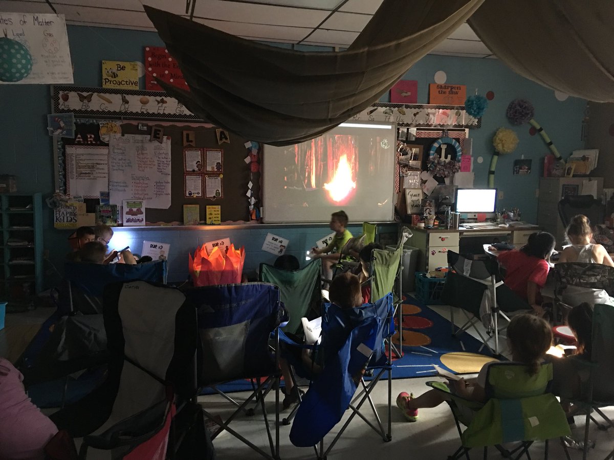 TeachLim's tweet photo. Reading in front of a campfire is the best! #camplearnedalot #flashlightreading https://t.co/UI8GiozXZj