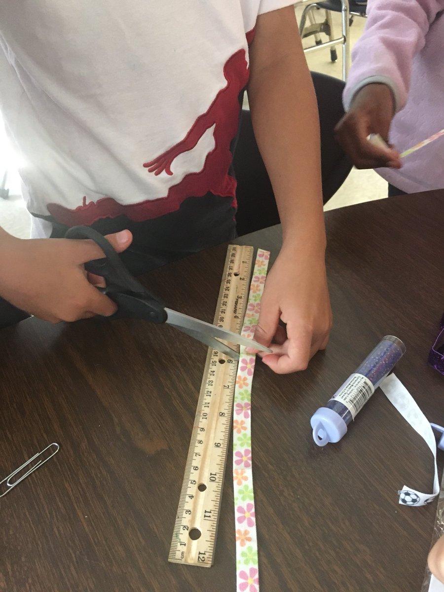 ElizMccue's tweet photo. Using our measuring skills to create necklaces and other art @BeaumontMagnet https://t.co/DD1IW1OZ69