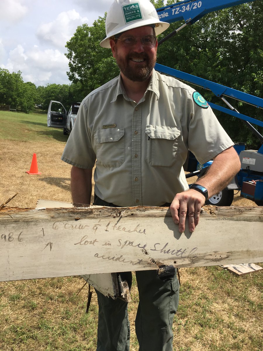 TXParksCCC's tweet photo. Finding "hidden messages" on the back of siding at the historic #FanthorpInn in Anderson, TX. @TPWDparks staff learned the ins-and-outs of wooden siding replacement and took lift safety training. #txstateparks #historicpreservation #preservation #texashistory https://t.co/c91QqrMXZY