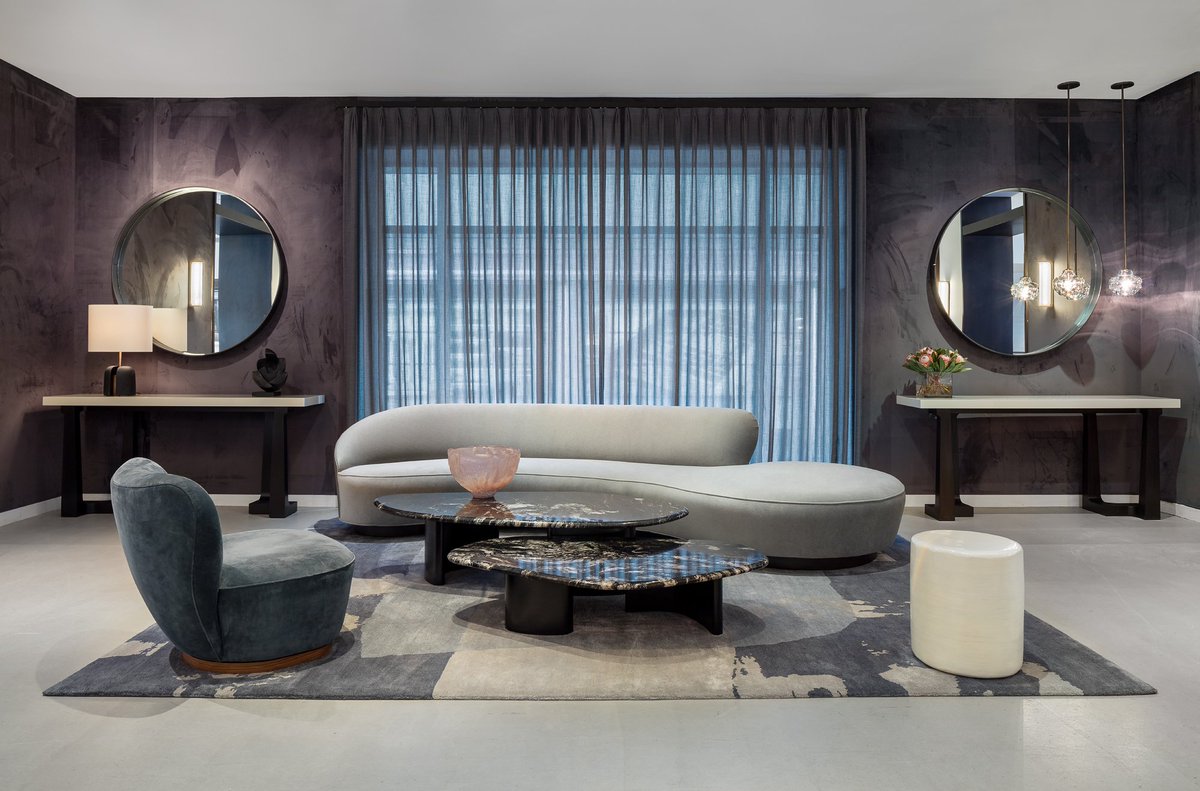 HollyHuntDesign's tweet photo. A stunning look inside at our #HOLLYHUNTNewYork showroom located at the #ADBuilding! The Madagascar #CocktailTable is paired beautifully with @VladKagan Serpentine #Sofa. The smooth and sensuous lines of both pieces would give a splash of flair to any space! #HOLLYHUNT #furniture https://t.co/Dy9i31fntR
