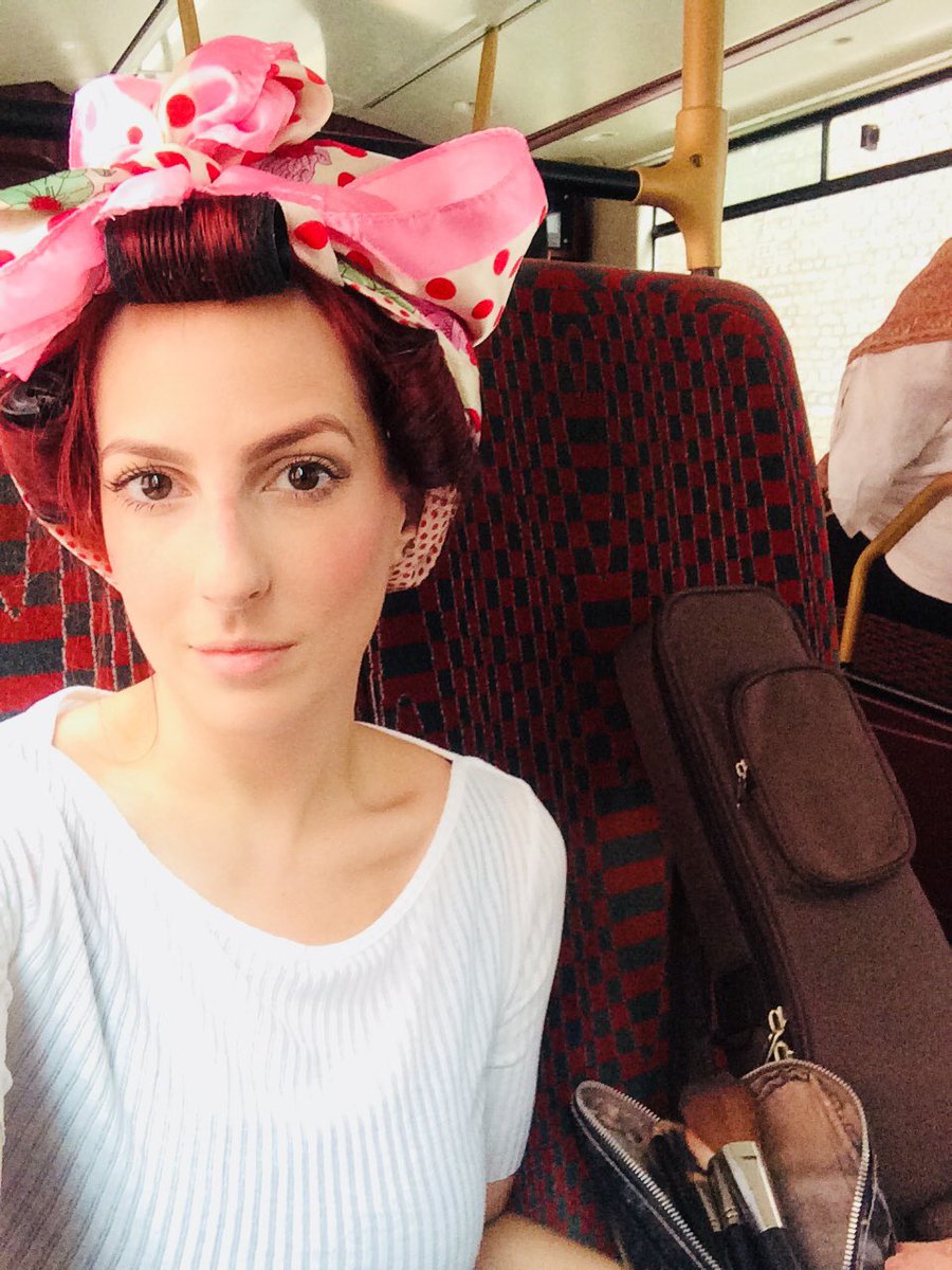 TheCandyGirlsUK's tweet photo. En route to meet fellow Candy Girls for a gig at the iconic @BAFTA tonight - rollers in, doing make up on the bus, who said this life isn’t glamorous..? #bafta #singerslife #londongigs #vintage #rollers #vintagesinging #usherettes #piccadilly #london #gigging https://t.co/VitzqTqusZ