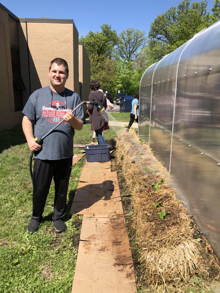 Transition students planted pumpkin plants in the straw bales today! 🎃🌼#strawbalegardening #lznation