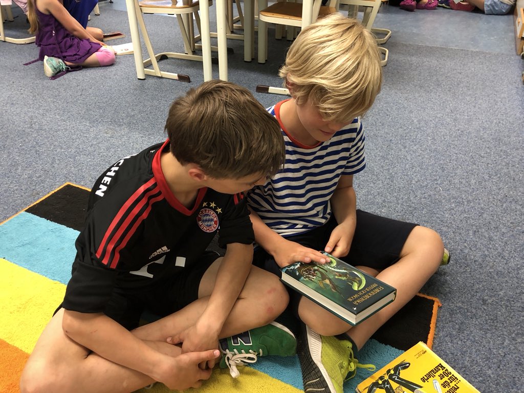 Ms_Hodel3HM's tweet photo. Mother Tongue Day!! Love seeing the pure happiness on their faces when they get to share important things from their culture. @FIS_School @MBSteidl #readersweek #mothertongueday #culture #identity #favoritebooks https://t.co/ApoMiqXWC7