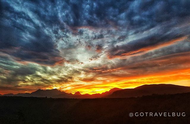 gotravelbug's tweet photo. Sunset over our Outeniqua Mountains range. What a stunning evening #howzitsouthafrica #meetsouthafrica #explore #skypainter #dametraveller #light #sunset #moments #skypainter #visualstoryteller #instagood #Skyexing #wildernessza #gardenroute #travel #tr… https://t.co/BJCuvInoyD https://t.co/Dsk86vLGkj