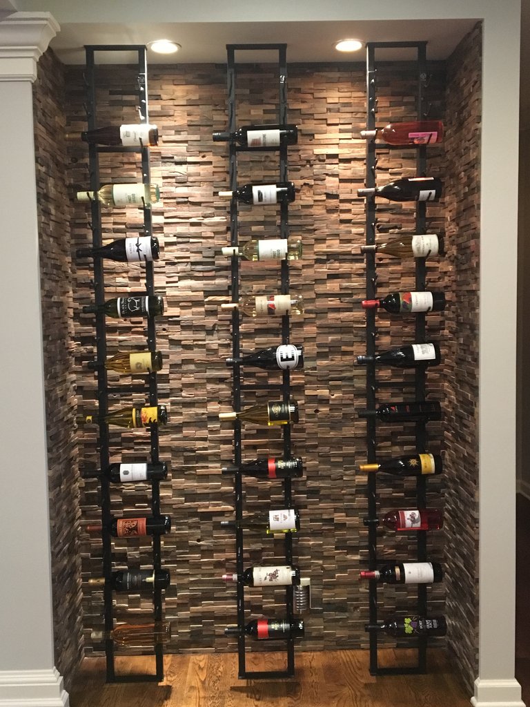 ModWineCellars's tweet photo. A shallow alcove can be turned into a focal point utilizing stone veneer on the wall and @VintageViewWine Floor-to-Ceiling Frames. Designed by @WineRackCo #winestorage https://t.co/Ckb2pV1EOo