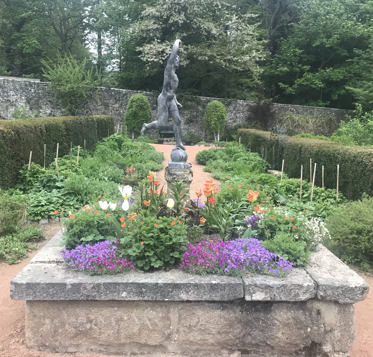 Our mercury statue is always surrounded by colourful flowers in the walled garden. He takes pride of place right in the middle of it all. Surveying the trees, flowers, birds and bees. #candacraig #walledgarden #Scotland #nature #visitABDN #Cairngorms #historicalscotland
