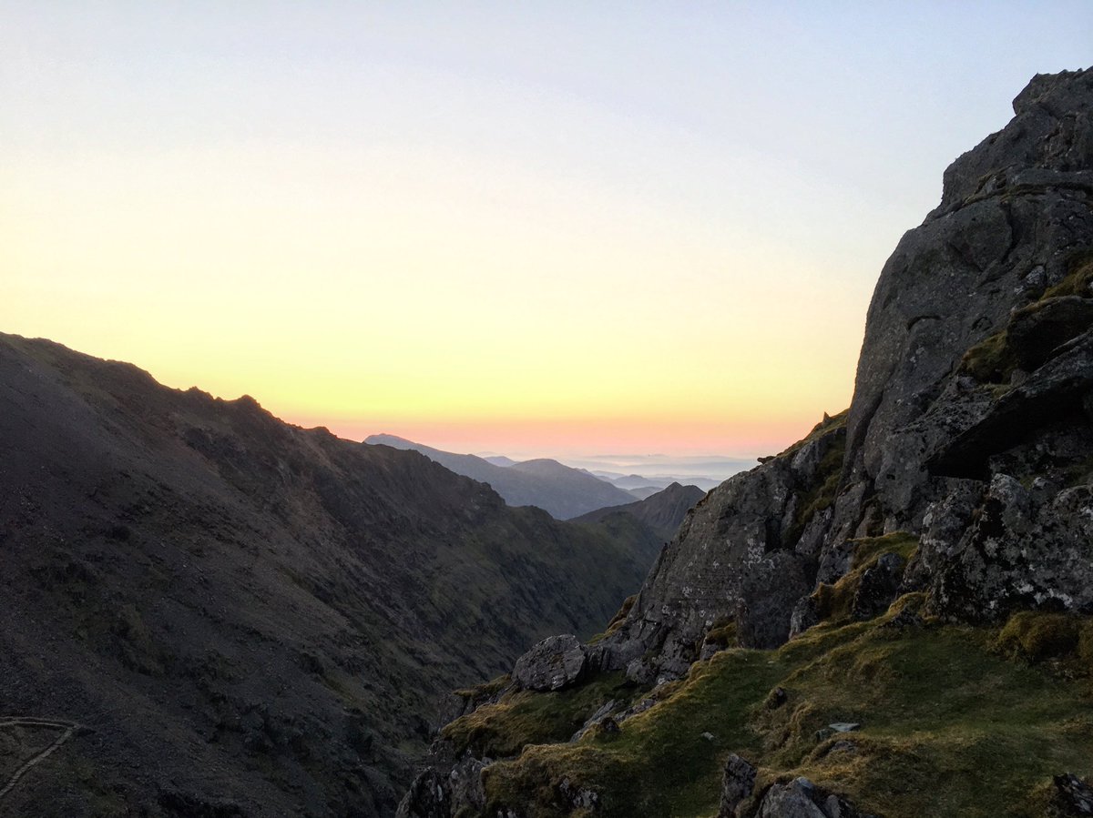 CampsUltra's tweet photo. Some wild camping on top of Snowdon last night. Views across Crib Coch on the run down this morning. Night spent on hard rock. Small price to pay for priceless views. https://t.co/1Vh4geBBo7