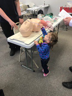 911Programs's tweet image. Half way through National Emergency Services Week and our own EMT students are working hard on their training and we even got to have a small EMT-in-training on campus this week!! #NationalEMSWeek #EMTintrainning #911Programs