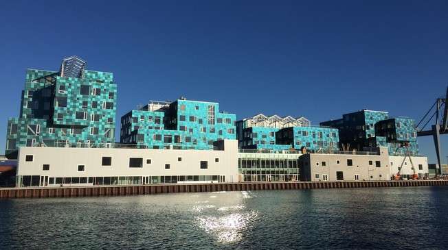 NaijaFlyingDr's tweet photo. Copenhagen International School's new building is covered by 12,000 colored solar panels.  They completely cover the building and will provide it with 300 MWh of electricity per year, meeting over half of the school's energy needs.

Read more at: https://t.co/U9kcqOWaHP https://t.co/r9Au1Rn4o4