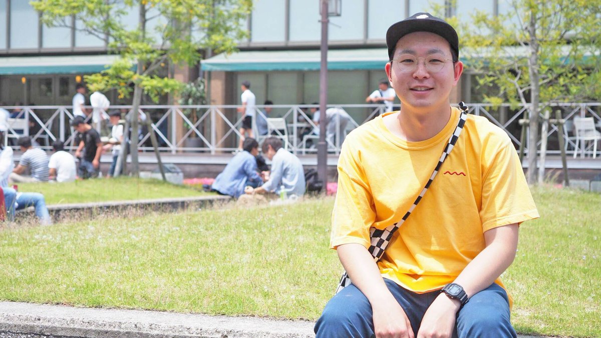 阪南大学 Hannan University Hannan Fashion Snap 流通学部の3回生の陽向さん グッドカンパニーのオレンジtシャツが差し色になっていて個性的です よく雑誌のポパイを読んでファッションの参考にされているようです 落ち着いた雰囲気の素敵な