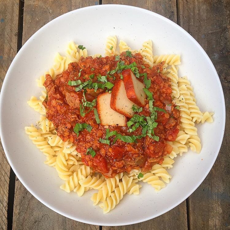 It’s a tough job to beat the classics isn’t it? 🍝 Simple pasta bolognese using our plant-based mince, and topped with basil &amp; I am Nut Okay smoked (dairy-free) cheese 🌱✌️ shop now, £1.99 delivery on all orders over £30! What you waiting for? Vbites.com