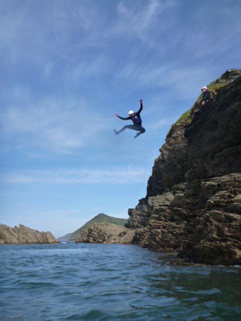 Getting ready to kick off a busy summer in #northdevon <a href="/Watermouth_Cove/">Watermouth Cove</a> .Last week with the <a href="/Volcom/">Volcom Stone</a> crew getting some jumps in while the sun was out in full force! Who else wants to do some #coasteering this summer? Give us a call <a href="/activeescapeuk/">Active Escape</a>
