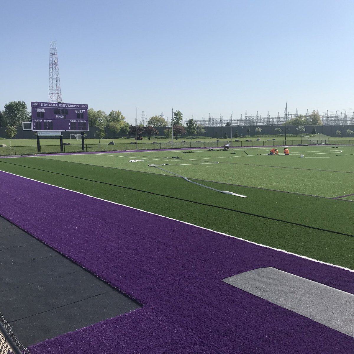 NiagaraWLAX's tweet photo. We’re starting today’s #turfupdate with a little #tbt of the old Monty! Slide to see a little more progress and a whole LOT of purple!!! #outwiththeoldMonty #inwiththenew #newturfwhodis #purplepride #powerofNiagara https://t.co/ISw01RQY60