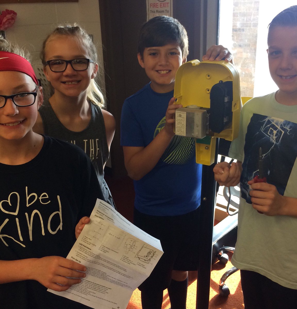 NancyKriener's tweet photo. A little technical reading this morning as we put together our sunscreen dispenser for our #projectjack grant at #SpiritLakeCSD @iowarealtors https://t.co/iFN8TwEg7P