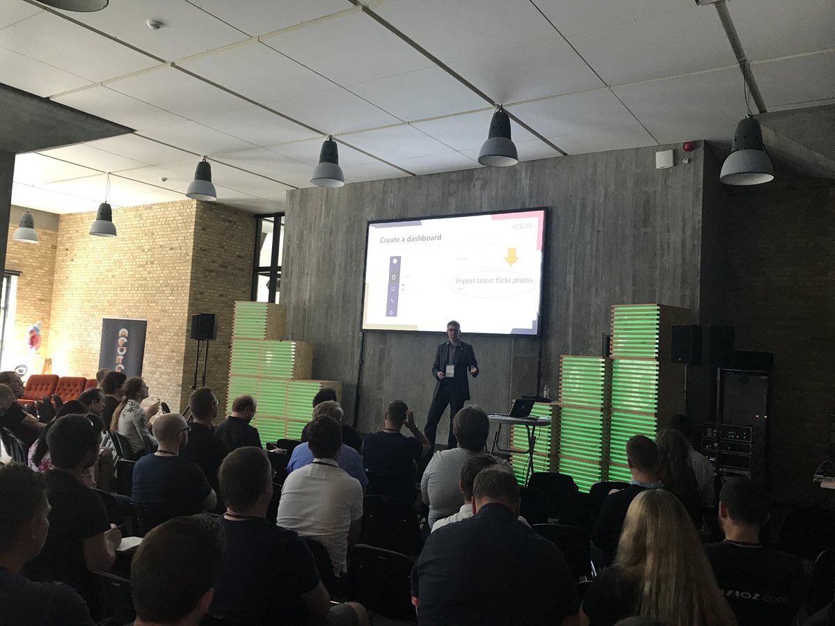 On The Theatre stage - Damiaan Peeters <a href="/dampeebe/">Damiaan Peeters</a> and his talk on “Magically integrating external data” 🙌 #umbraco #codegarden #CG18