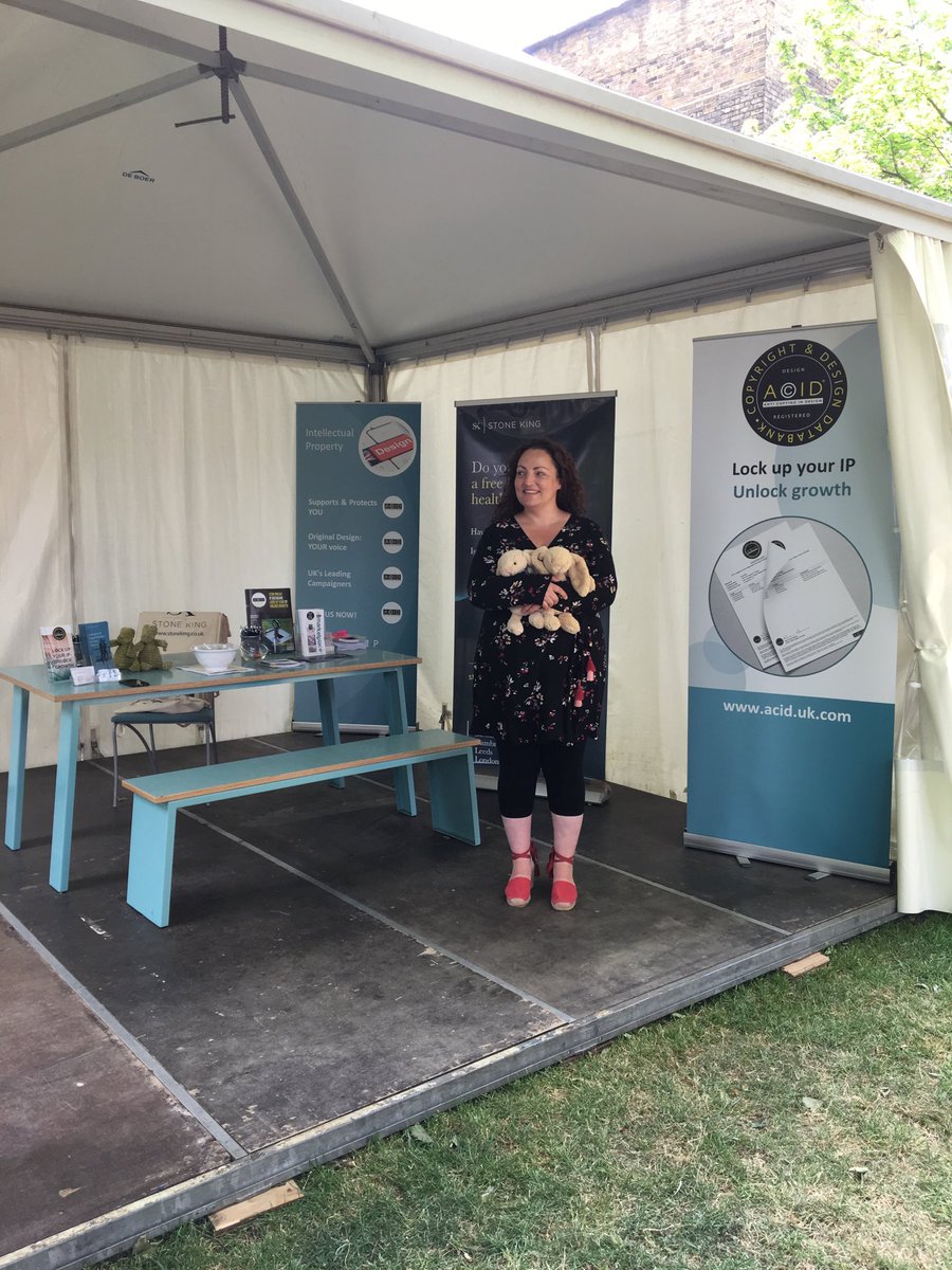 stephanievicic's tweet photo. Our @ACID_tweets colleague Lizzie holding the bunnies. One is real and one is fake but which is which? Come and play the #IPgame with us today! #intellectualproperty #design #CDW2018 @StoneKingLLP @TheDesignLawyer @DidsMacdonald https://t.co/W1ZP0F30zl