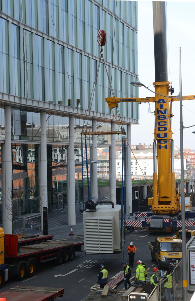 WatesGroup's tweet photo. Where there's a will, there's a way! #ThrowbackThursday to our amazing team lifting a 6 tonne generator onto the 14 storey 2 Snowhill in #Birmingham as part of@GowlingWLG_UK Cat B fitout #Commercial https://t.co/5SZuHBspZ7