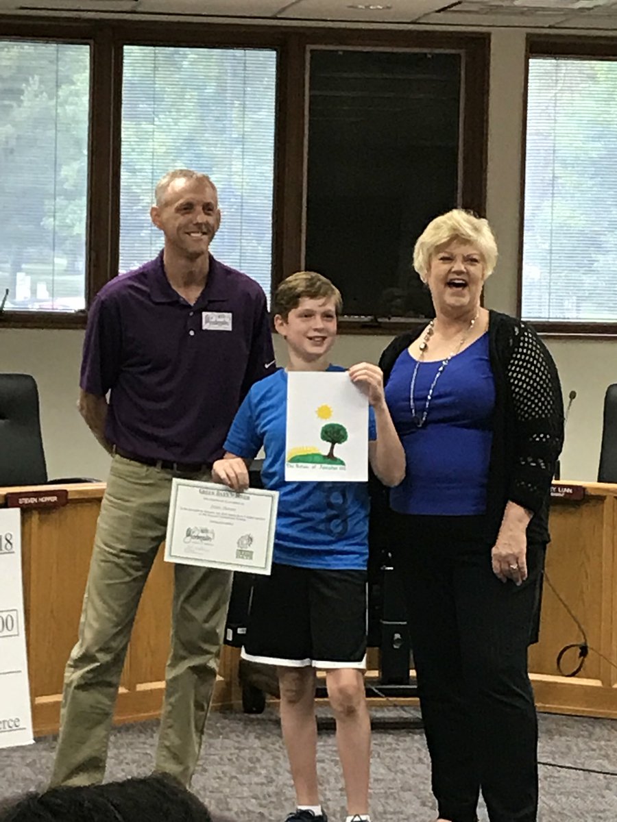 JCSD_WAEart's tweet photo. Congratulations to Fisher!  He was Wallace’s winner of the Johnston Green Day’s T-shirt contest. We are so proud of you and your hard work!  @JCSD_WAE https://t.co/GjOefEe6Rk
