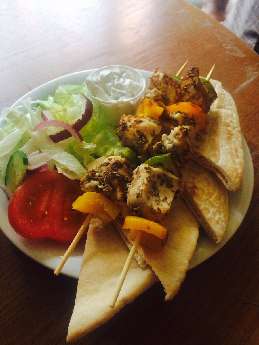 Have you tried any of our new menu yet? Our lemon and rosemary chicken kebabs with pitta and tzatziki are a hit! #newmenu #tasty