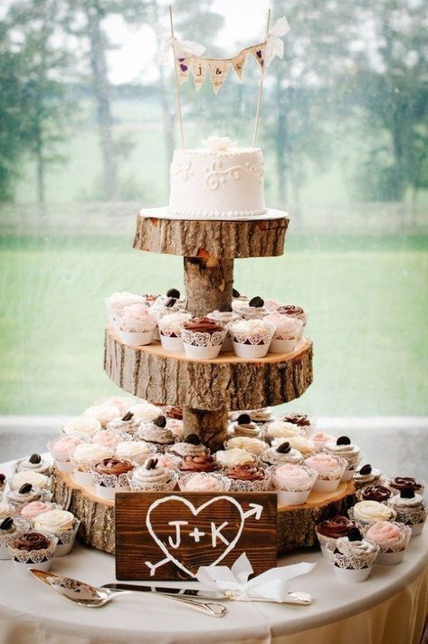 We Love This Rustic Wedding Cupcakes and Tree Stump Topper! #Rustic #Wedding #WeddingCake <a href="/WeddingAffair/">The Wedding Affair</a>