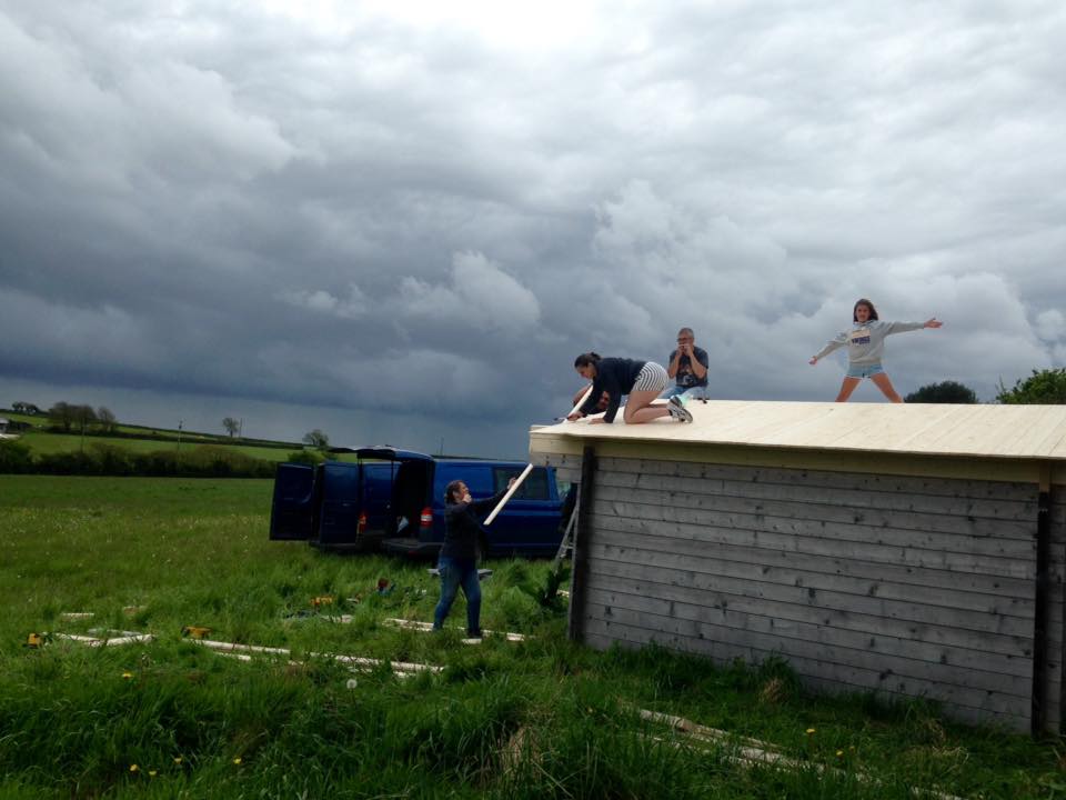 colwhiting's tweet photo. Getting the cabin roof on just in time... https://t.co/2rI8TJICUx