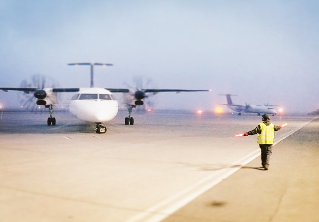 CYSB_FBO's tweet photo. One of #EA's finest marshalling out #Westjet #WR3575 at #CYSB. #Q400. #Sudbury #Airport #rampservices https://t.co/gBfbnAKT7W