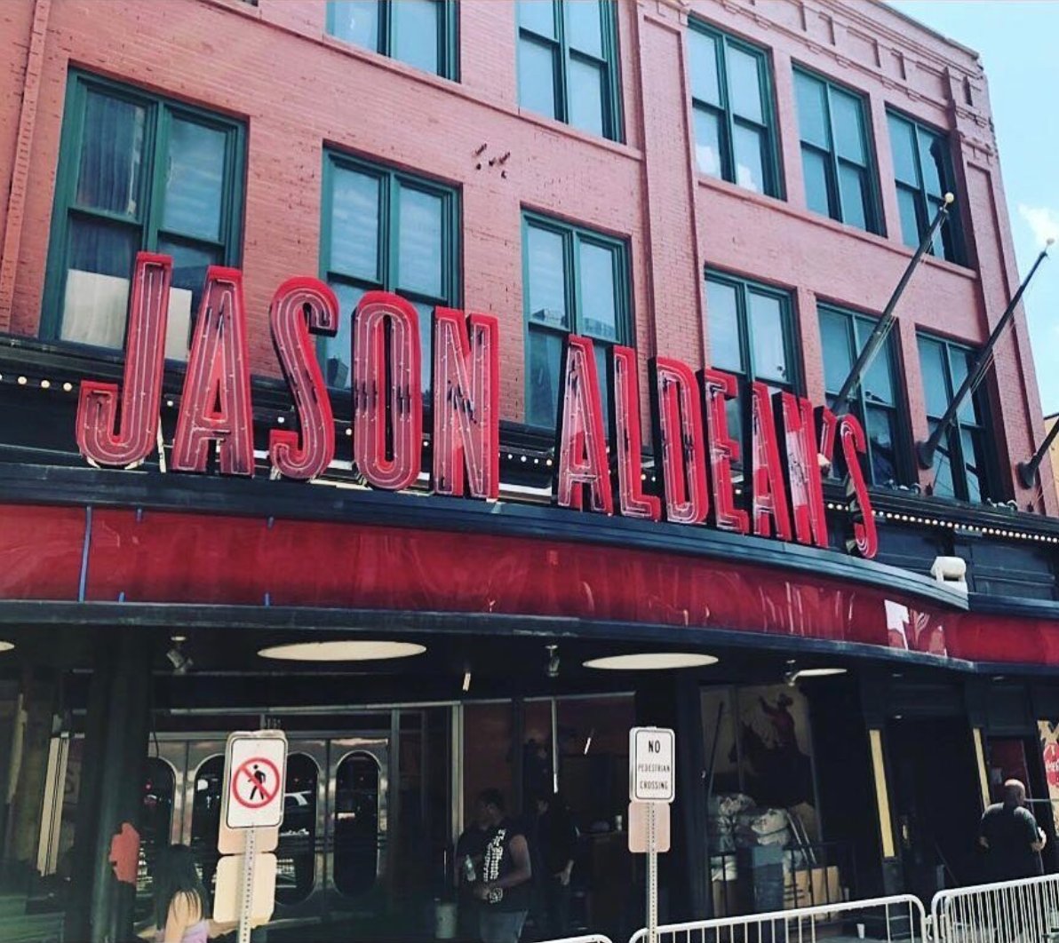 Jason_Aldean's tweet photo. the @jasonaldeans sign is officially up on lower broadway. This place is gonna be insane!! I cant wait for everybody to come check it out when we open in a couple weeks. 🥃🍹🍺 #nashville https://t.co/L22Gqle0aR