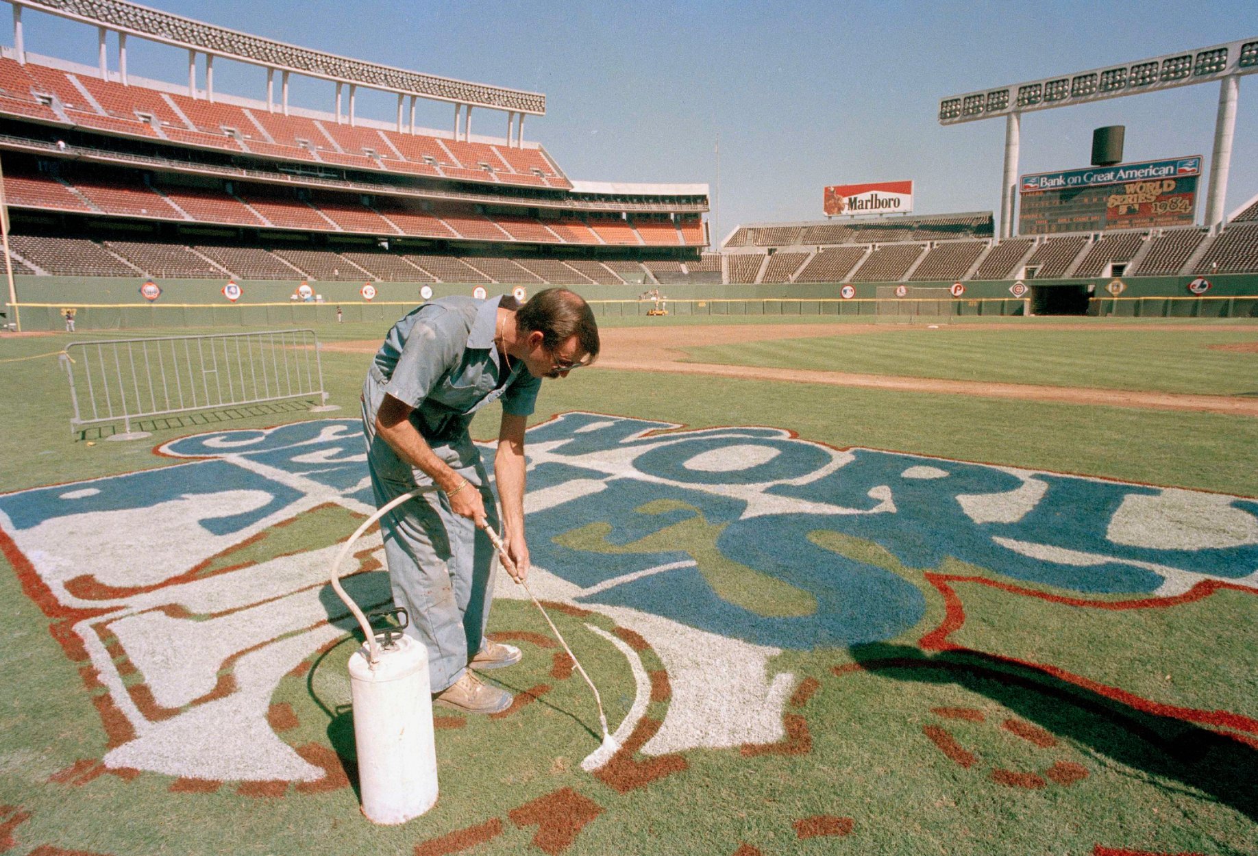 Chris Creamer  SportsLogos.Net on X: Painting the World Series logo on  the field at Jack Murphy Stadium in San Diego for the 1984 World Series  between the San Diego #Padres and