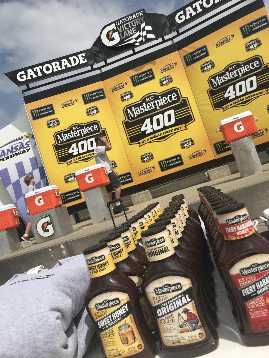A bottle of <a href="/kcmasterpiece/">KC Masterpiece</a>, a <a href="/kcmasterpiece/">KC Masterpiece</a> t-shirt and a selfie with <a href="/AJDinger/">AJ Allmendinger</a> and <a href="/Chris_Buescher/">Chris Buescher</a> in Victory Lane. What could be better? #KCM400