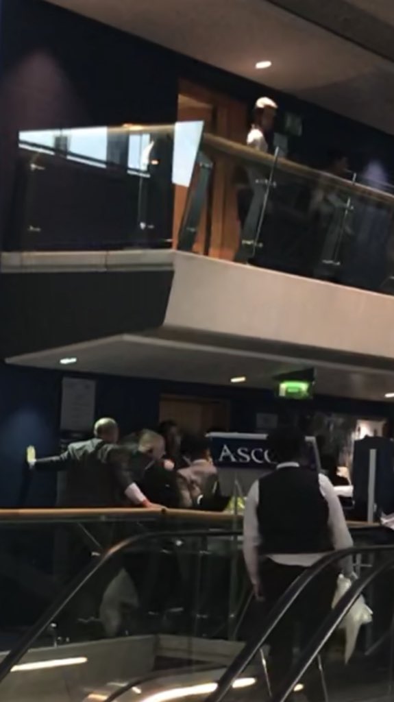 kellypolopink's tweet photo. Stupid fighting at @Ascot today. How I or my family avoided getting bottled or punched is a miracle that window was next to our table! #HorseRacing #Ascot https://t.co/2VrewQ6Poy