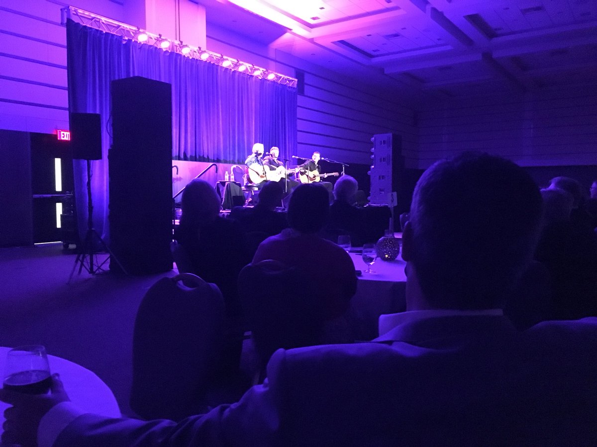 Robb_Baird's tweet photo. @roquejrsoccer @markpkennedy My seat is better, @roquejrsoccer (Big thanks, @markpkennedy) #igsongwriters #kneeslap #AtlanticCanada Living https://t.co/IjXha8HI8A