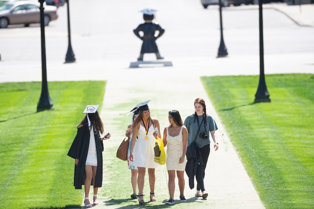 uiowa's tweet photo. When you see all your years of hard work paying off. #UIGrad18 🖤💛🎓 https://t.co/zHdYMppcvQ