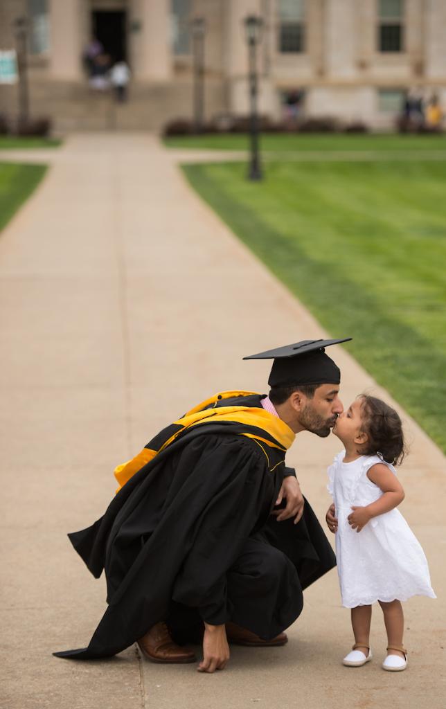 uiowa's tweet photo. When you see all your years of hard work paying off. #UIGrad18 🖤💛🎓 https://t.co/zHdYMppcvQ