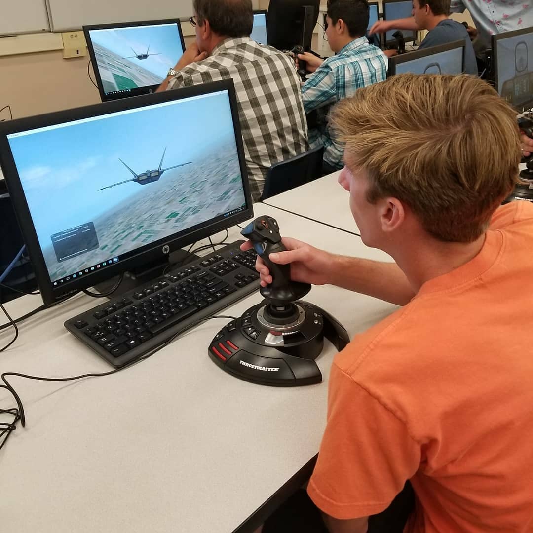 reedleycollege's tweet photo. Flight simulators, drones, jet engines, golden tickets, a ribbon cutting and more, our #FlightScience Open House was a complete success! Thanks to everyone for your support. Can't wait to get started in August! #GoTigers https://t.co/lAFRUV8Ogl