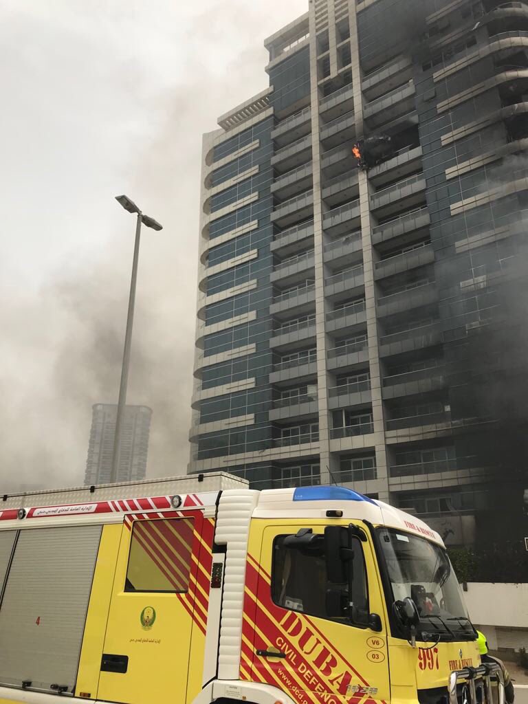 Sajwani's tweet photo. #Dubai Civil Defence @DCDDubai controls the fire that broke out in #ZenTower in the #DubaiMarina area amidst extremely windy and dusty weather conditions; the building was evacuated safely and no injuries were reported. @DXBMediaOffice https://t.co/YeDFC7r2nR