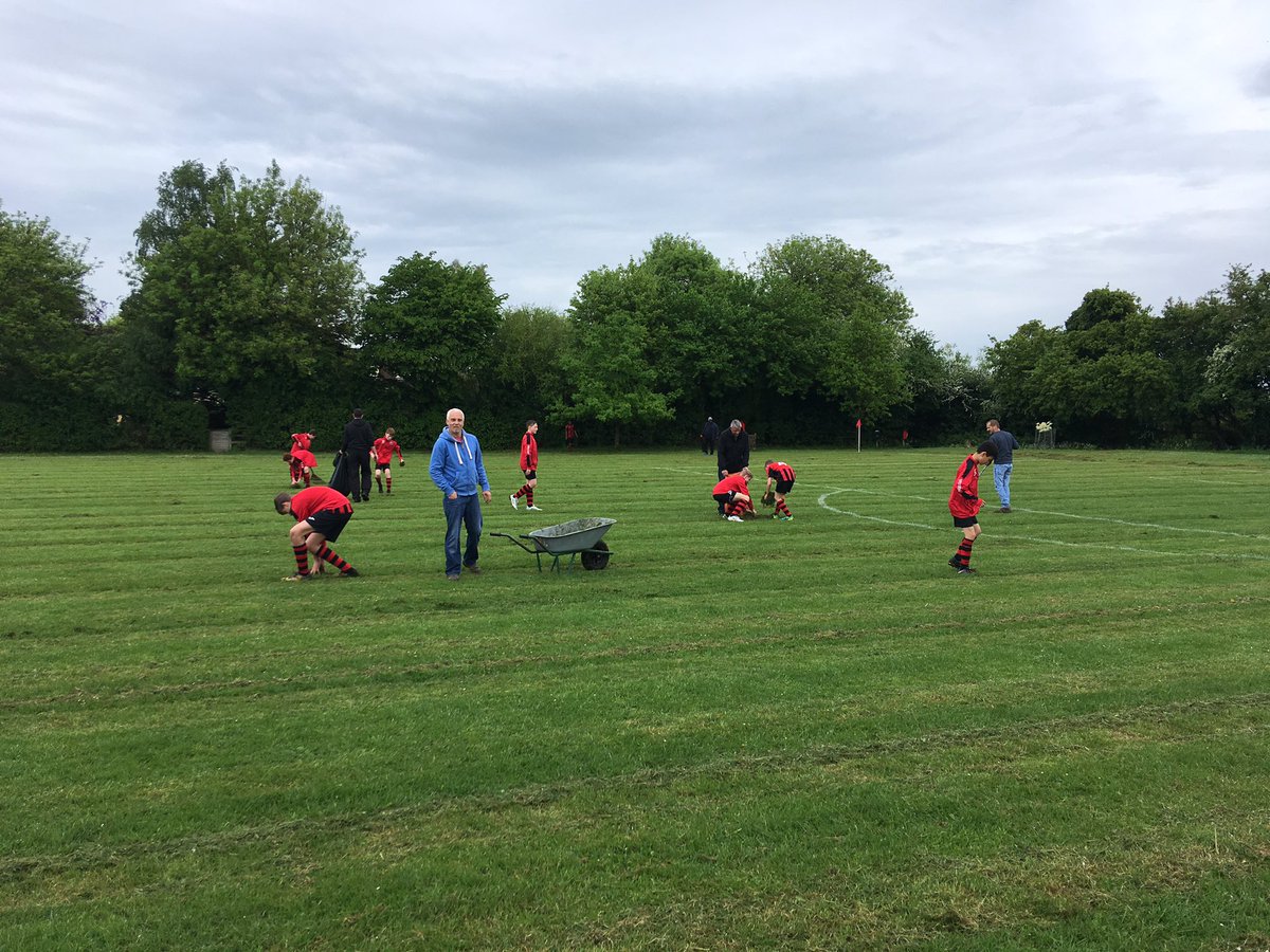 njcbailey's tweet photo. Is there a better definition of #grassrootsfootball?! Champions elect @SWCommunityFC under 13 blues raking the pitch and clearing grass before final home game of the season. #uptheyoungbloods #winningwithstyle https://t.co/noNY2TpLlC