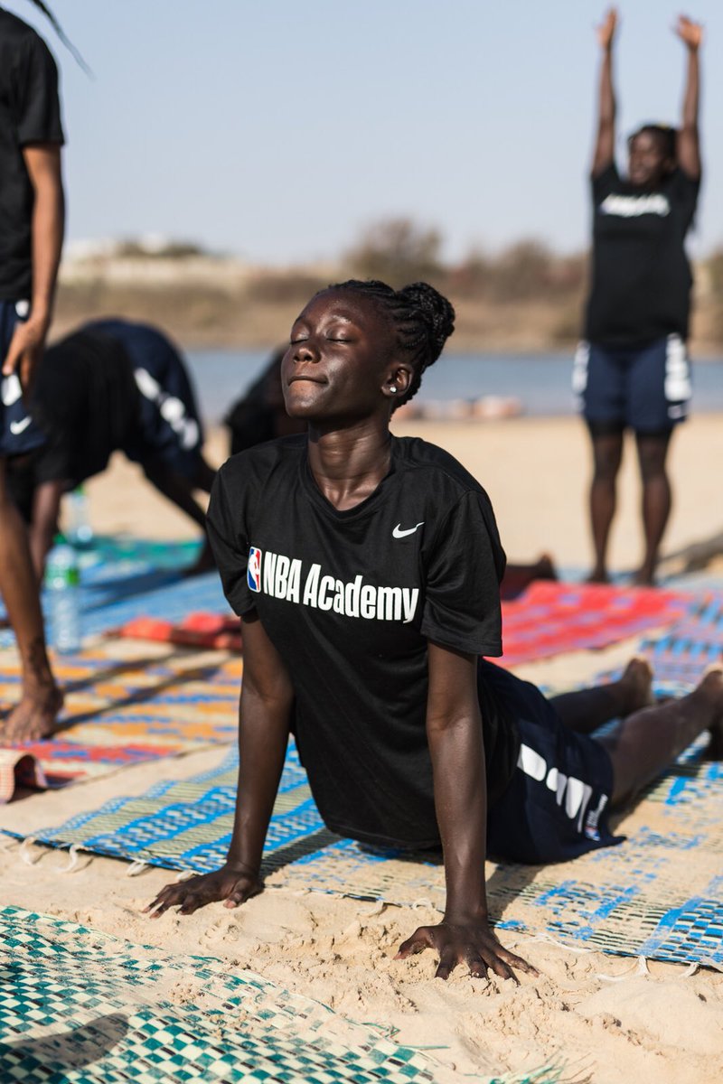 NBA_Africa's tweet photo. Yoga Time for our #NBAAcademy Africa Campers 🤸🏾♀️🤸🏾♀️🤸🏾♀️
If you're in Dakar, come watch them work today at African Renaissance Monument for the #SEEDHoopForum's All-Star Game today ! Tipoff at 3pm 🏀 https://t.co/70Jq74cOjB