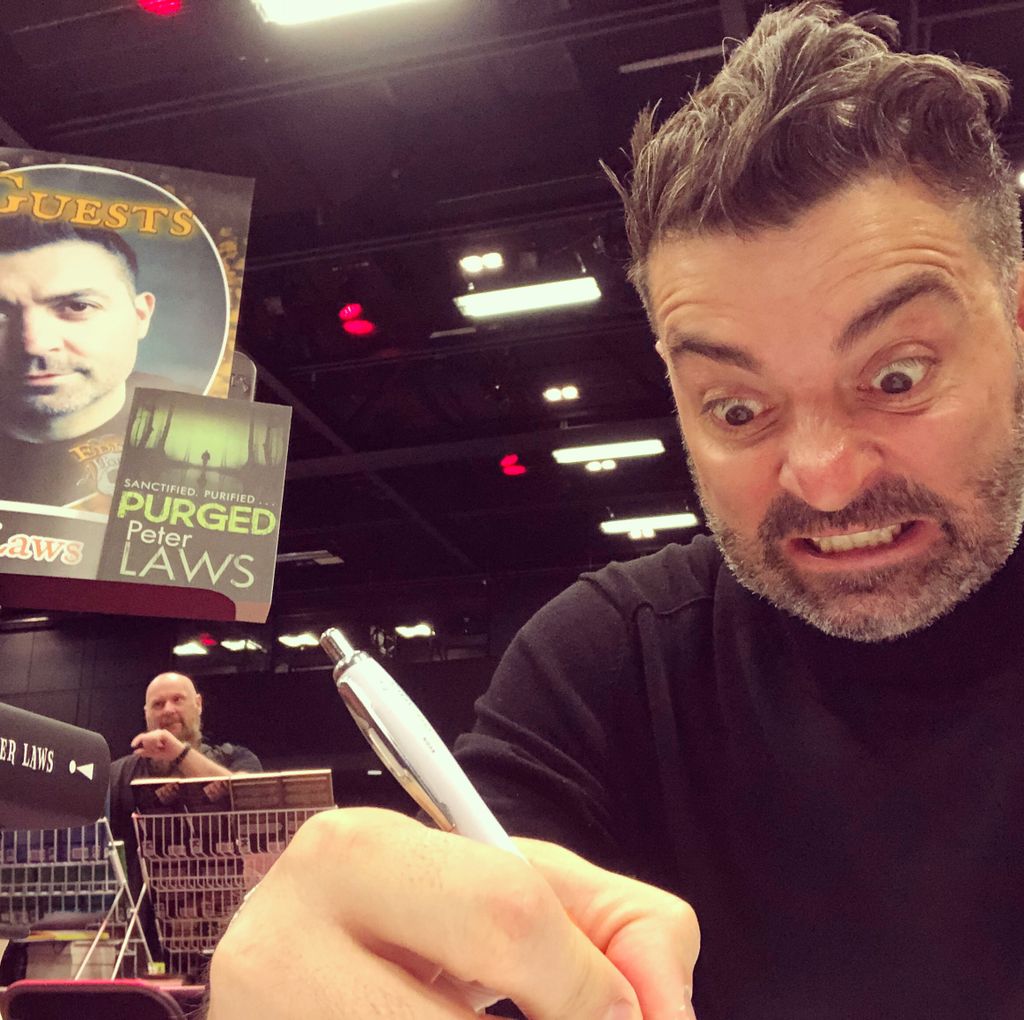 revpeterlaws's tweet photo. Book signing face at the ready! @edinburghhorrorcon #horrocon https://t.co/TdnucT8QP8
