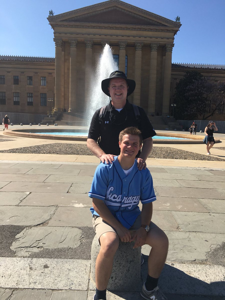 AQ_berry's tweet photo. My dad and brother went to the Rocky steps and a homeless man offered to take their picture and got them to make these poses; afterwards he asked for money. I don’t think My dad has spent a better $20. Thank you random homeless man. https://t.co/TAcI3hJIop