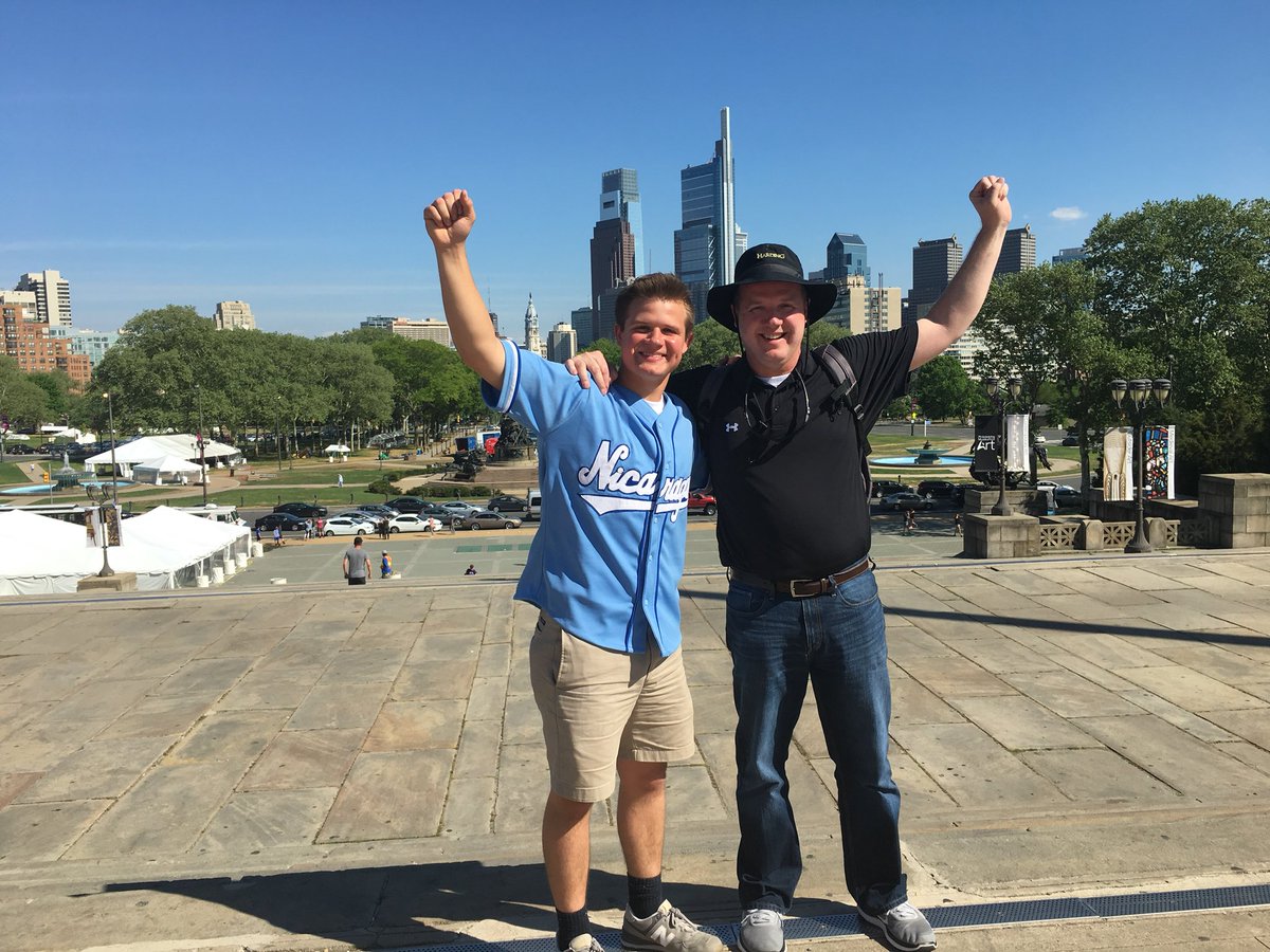 AQ_berry's tweet photo. My dad and brother went to the Rocky steps and a homeless man offered to take their picture and got them to make these poses; afterwards he asked for money. I don’t think My dad has spent a better $20. Thank you random homeless man. https://t.co/TAcI3hJIop