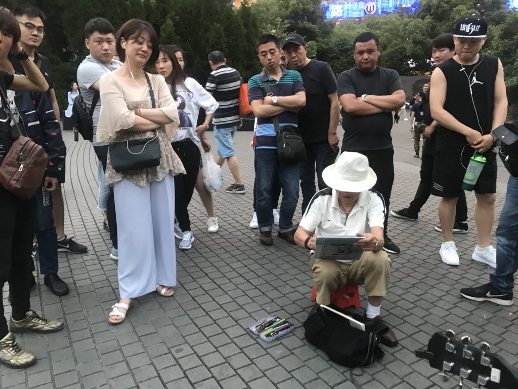 dreworder's tweet photo. Went to a park today and played a little show on guitar. Some man drew my portrait and I got some people to watch me. I gave away the guitar when I was done since I can’t bring it home. https://t.co/yDzK0UCY97