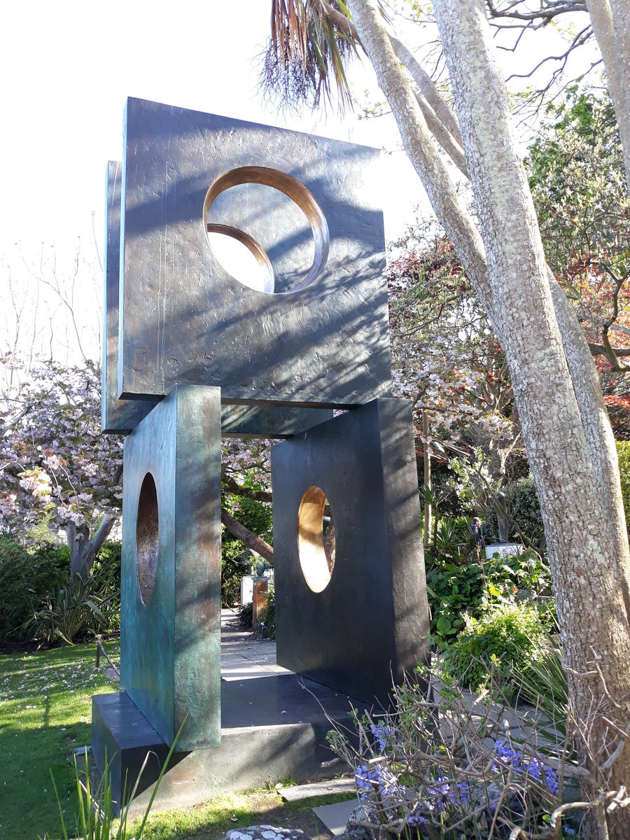 Tate_StIves's tweet photo. The weather is set to improve next week, so perfect for visiting the Barbara Hepworth Museum and Sculpture Garden. Here is 'Four Square Walk Through' in the evening sun... #tatestives https://t.co/UgDIhsbGft https://t.co/Lojdsa0MIh