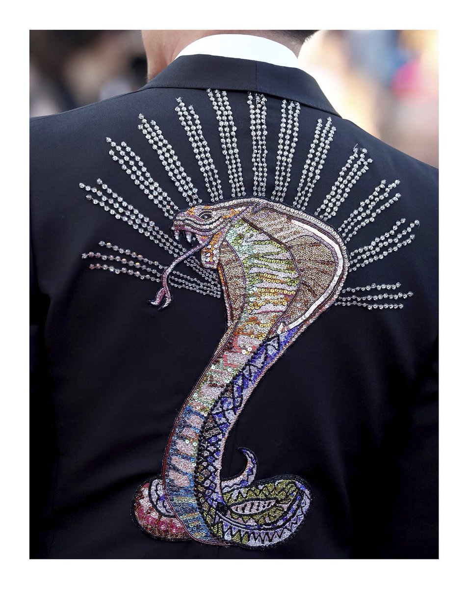 gucci's tweet photo. To the 71st annual @Festival_Cannes, jury member #ChangChen wore a #GucciDIY Signoria tuxedo with embroidered cobra, formal evening shirt with bee and star print, silk bowtie and black leather loafers with Horsebit detail to the screening of 'Ash Is The Purest White’. #Cannes2018 https://t.co/3fv34b7QCb