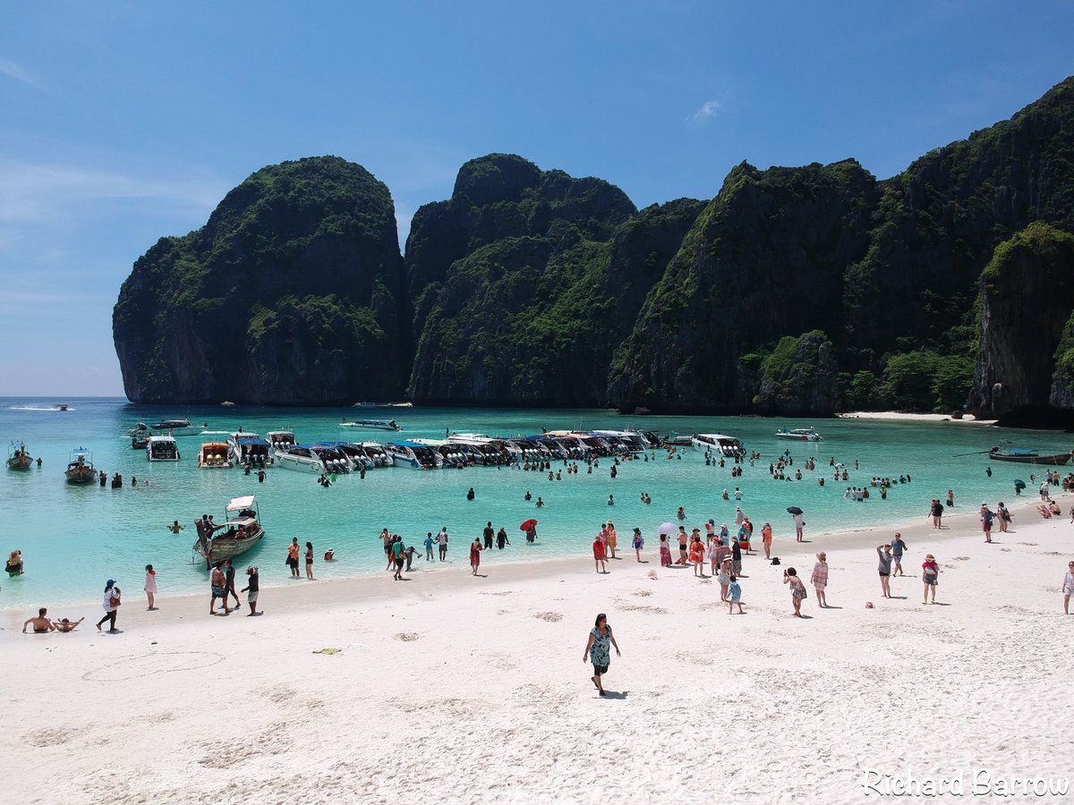 Drone photos of Maya Bay on Phi Phi Ley. The island is expected to close to all tourists for four month from 1st June. Phi Phi Ley is the most popular stop for tourists in Hat Noppharat Thara-Mu Koh Phi Phi National Park. 1.65 million tourists visited this park in 2017 #Thailand
