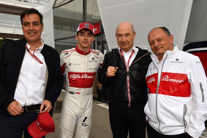 Pascal Picci, Charles Leclerc, Peter Sauber and Frederic Vasseur in front of the team hospitality