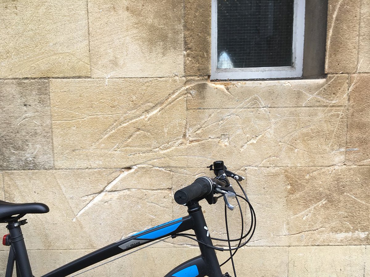 Erosion caused by bikes in Ketton Stone at #CorpusChristiCollege, #Cambridge #BikeBioturbation #UrbanGeology