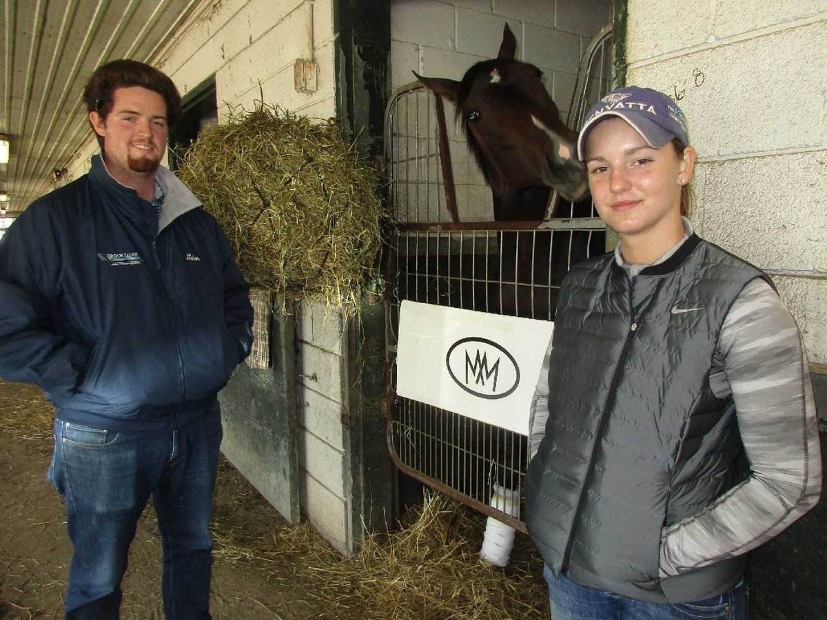 PLefko's tweet photo. #NolanRamsey (asst. to #MikeMaker) & his wife, former jockey #KatieClawson, with one of their horses at #Woodbine. https://t.co/2AMJam0rjA