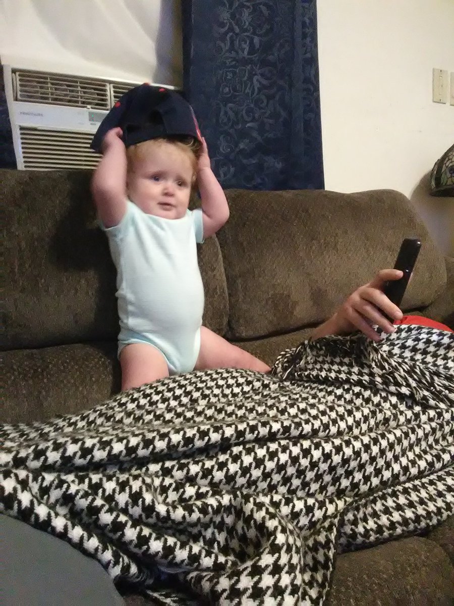 Tide_grl113's tweet photo. She grabbed daddy's hat on her own &amp; started putting it on her head #ALLCAPS #Capsbaby https://t.co/eIqFcV9k2c