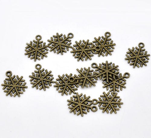 QuirkyGemstones's tweet image. 10 Bronze Snowflake Pendants Charms - 20mm tuppu.net/68d2a155 #CraftSuppliesShops #Etsy #SilverSnowflake